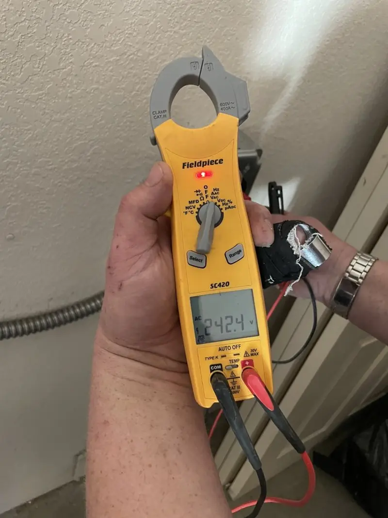 Voltage testing with clamp meter during Generator Installation in Livingston